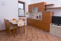 Kuchyň nebo kuchyňský kout v ubytování Apartmani MIRA