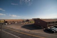 an empty parking lot in front of a building at Bryce View Lodge Part of the Ruby's Inn Resort in Bryce Canyon