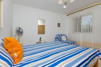 Posteľ alebo postele v izbe v ubytovaní Rooms Roza