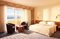 Postel nebo postele na pokoji v ubytování Family Hotel Pagus - All Inclusive
