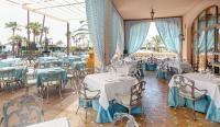 A restaurant or other place to eat at Hotel IPV Palace & Spa - Adults Recommended