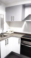 Kuchyň nebo kuchyňský kout v ubytování Apartamentos Atlas Terrassa III
