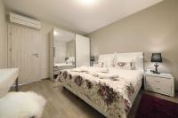 Posteľ alebo postele v izbe v ubytovaní Luxury Majpruz Suites