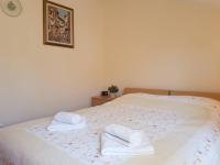 Postel nebo postele na pokoji v ubytování Apartment Jana