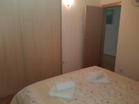 Postel nebo postele na pokoji v ubytování Apartment Jana