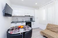 Kuchyň nebo kuchyňský kout v ubytování Apartments A&M