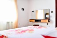 Posteľ alebo postele v izbe v ubytovaní House & Apartment Palača