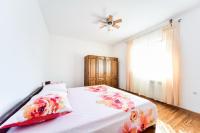 Posteľ alebo postele v izbe v ubytovaní House & Apartment Palača