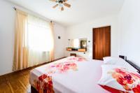 Posteľ alebo postele v izbe v ubytovaní House & Apartment Palača