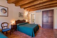 A bed or beds in a room at Apollo B&B