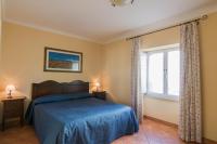 A bed or beds in a room at Apollo B&B