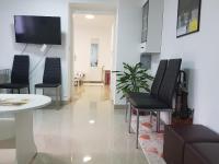 Televízia a/alebo spoločenská miestnosť v ubytovaní Apartman Maksimir Relax Zagreb-75m2