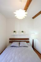 Llit o llits en una habitaci&oacute; de GregBnb-com - T2 Cosy et design - PARKING INCLUS - WiFi - 15min Gare