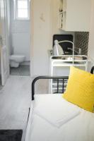 Posteľ alebo postele v izbe v ubytovaní Rába Apartman House