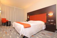 Łóżko lub łóżka w pokoju w obiekcie Hotel Major