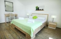 Posteľ alebo postele v izbe v ubytovaní Apartments Nemira Exclusive