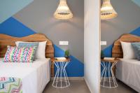 Posteľ alebo postele v izbe v ubytovaní Natali Apartments