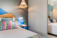 Posteľ alebo postele v izbe v ubytovaní Natali Apartments
