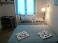 Posteľ alebo postele v izbe v ubytovaní Megaron11 Apartments