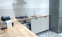 A kitchen or kitchenette at Appartamento tra mare e storia