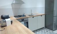 A kitchen or kitchenette at Appartamento tra mare e storia