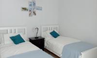 A bed or beds in a room at Appartamento tra mare e storia