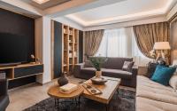 Televízia a/alebo spoločenská miestnosť v ubytovaní Acropolis Luxury Living