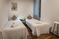 Postel nebo postele na pokoji v ubytování Habitat Apartments Alibei