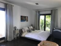 Łóżko lub łóżka w pokoju w obiekcie Villa Los Halcones Sotogrande Golf