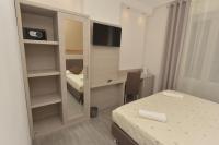 Posteľ alebo postele v izbe v ubytovaní Eden Rooms