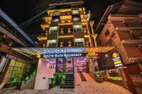 a building with a sign that reads south gate residency at South Gate Residency in Cochin