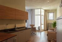Kuchyňa alebo kuchynka v ubytovaní La Bellavita Del Garda Luxury Apartments