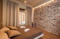 Posteľ alebo postele v izbe v ubytovaní La Bellavita Del Garda Luxury Apartments