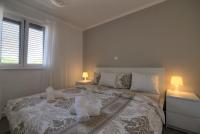 Posteľ alebo postele v izbe v ubytovaní Apartment Franko
