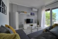 Televízia a/alebo spoločenská miestnosť v ubytovaní Apartment Franko