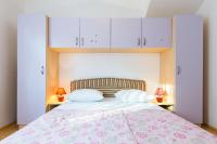 Łóżko lub łóżka w pokoju w obiekcie Apartments Villa Orion