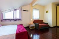 Łóżko lub łóżka w pokoju w obiekcie Apartments Villa Orion