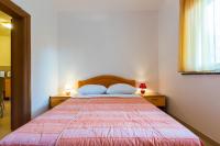 Łóżko lub łóżka w pokoju w obiekcie Apartments Villa Orion