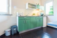 Kuchnia lub aneks kuchenny w obiekcie Apartments Villa Orion