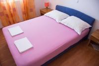 Posteľ alebo postele v izbe v ubytovaní Apartments Boćin Rosso