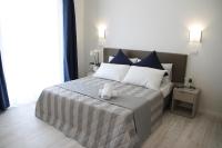 Posteľ alebo postele v izbe v ubytovaní Hotel Arena