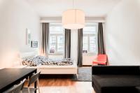 A seating area at easy flat Margareten Apartments