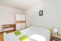 Posteľ alebo postele v izbe v ubytovaní Apartment Gordana Ghedda