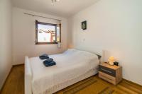 Posteľ alebo postele v izbe v ubytovaní Apartment Gordana Ghedda