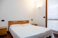 Posteľ alebo postele v izbe v ubytovaní Sirmio Apartments - Primavera Stay