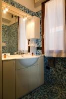 Kuchyňa alebo kuchynka v ubytovaní Sirmio Apartments - Primavera Stay
