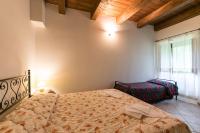 A bed or beds in a room at Agriturismo L'Antico Frutto