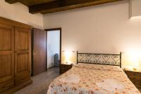 A bed or beds in a room at Agriturismo L'Antico Frutto