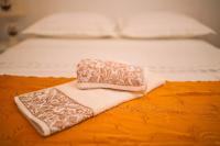 Posteľ alebo postele v izbe v ubytovaní Apartmani Kala