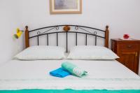 Posteľ alebo postele v izbe v ubytovaní Apartmani Kala